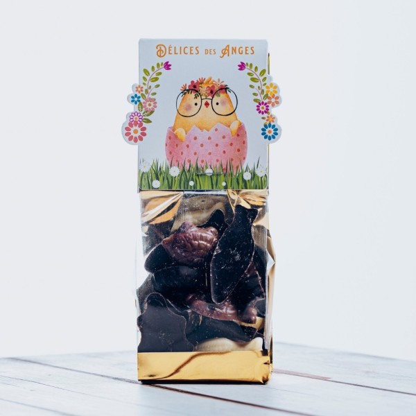 Sachet de petites figurines en chocolat lait, noir, blanc