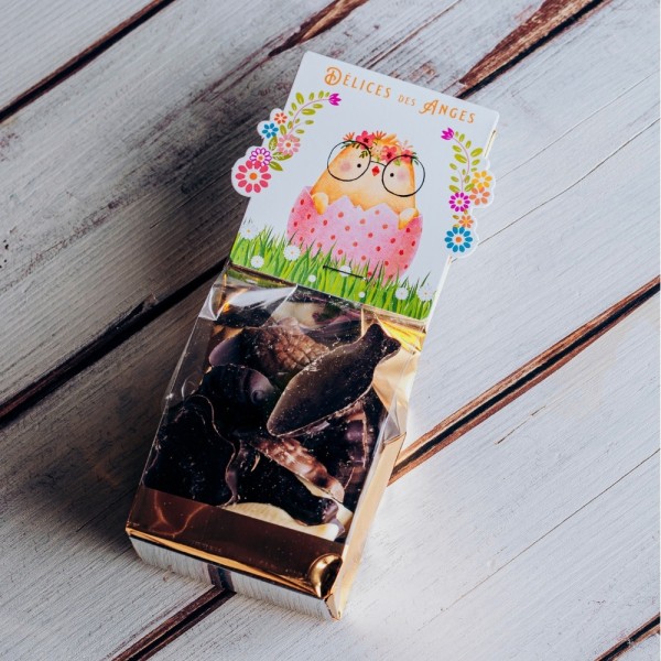 Sachet de petites figurines en chocolat lait, noir, blanc